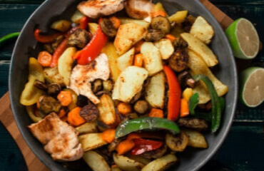 A chef making a stuffed parantha